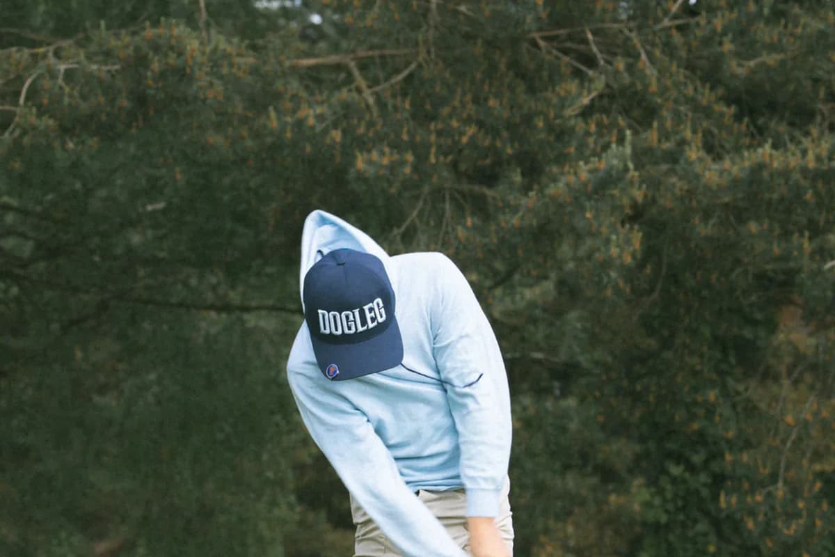 Two golfers in Dogleg caps out on the course