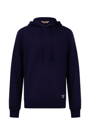 Hoodie Dogleg Clubhouse homme navy porté par un golfeur — hoodie cachemire, golf Suisse