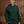 Hoodie Dogleg Clubhouse homme vert foncé porté sur le parcours — golf Suisse