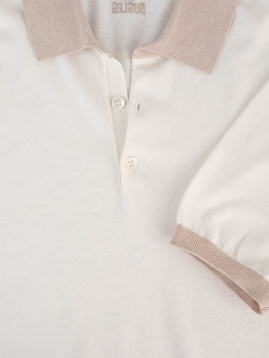 Polo de golf Dogleg en cachemire — douceur et élégance suisse