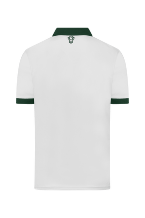 Polo de golf Dogleg Tour femme April Tradition porté par une golfeuse — golf Suisse