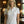 Polo de golf Dogleg Tour femme blanc et rose porté par une golfeuse — golf Suisse